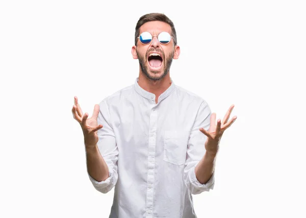 Joven Hombre Guapo Con Gafas Sobre Fondo Aislado Loco Loco — Foto de Stock