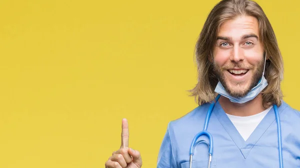 Young Handsome Doctor Man Long Hair Isolated Background Pointing Finger — Stock Photo, Image