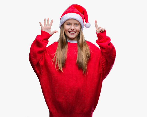 Young beautiful girl wearing christmas hat over isolated background showing and pointing up with fingers number six while smiling confident and happy.