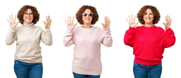 中年老年妇女穿着冬季毛衣在白色孤立的背景显示和手指指向数字十 同时微笑着自信和快乐 — 图库照片
