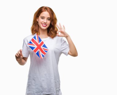 Amerika Birleşik Devletleri bayrağı parmak, mükemmel sembolü ile ok işareti yapıyor izole arka plan üzerinde tutan genç güzel kadın