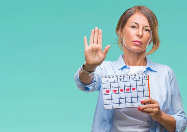 Middelbare Leeftijd Senior Spaanse Vrouw Houdt Van Menstruatie Kalender Geïsoleerde — Stockfoto