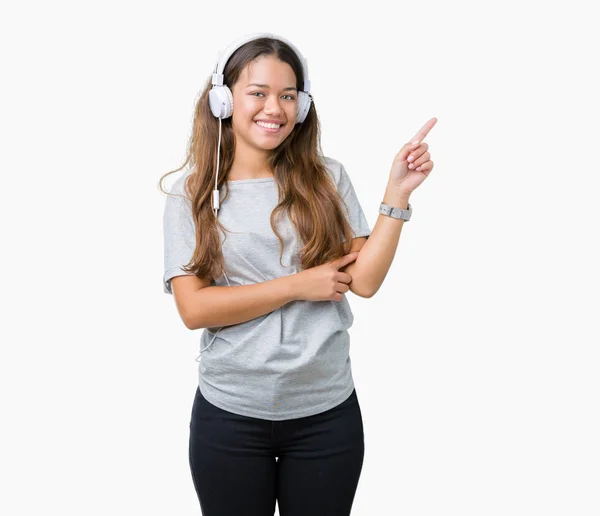 Junge Schöne Frau Mit Kopfhörer Die Musik Über Isoliertem Hintergrund — Stockfoto