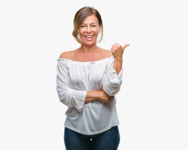 Orta yaş arıyor ve başparmak yanında yukarıyı mutlu yüz ile gülümseyen izole arka plan üzerine İspanyol kadın kıdemli.