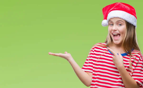 Joven Hermosa Chica Con Sombrero Navidad Sobre Fondo Aislado Sorprendido —  Fotos de Stock