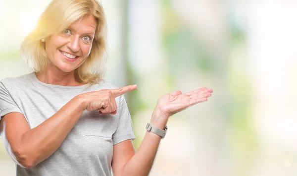 Middle Age Blonde Woman Isolated Background Amazed Smiling Camera While — Stock Photo, Image