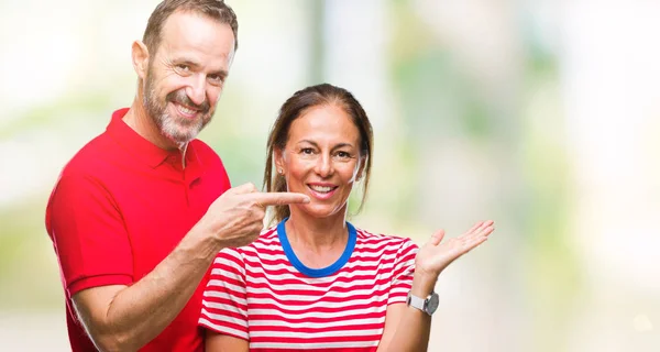 Middle Age Hispanic Couple Love Isolated Background Amazed Smiling Camera — Stock Photo, Image
