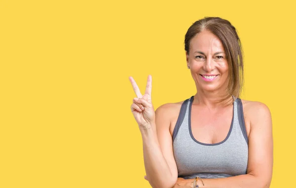 Beautiful Middle Age Woman Wearing Sport Clothes Isolated Background Smiling — Stock Photo, Image