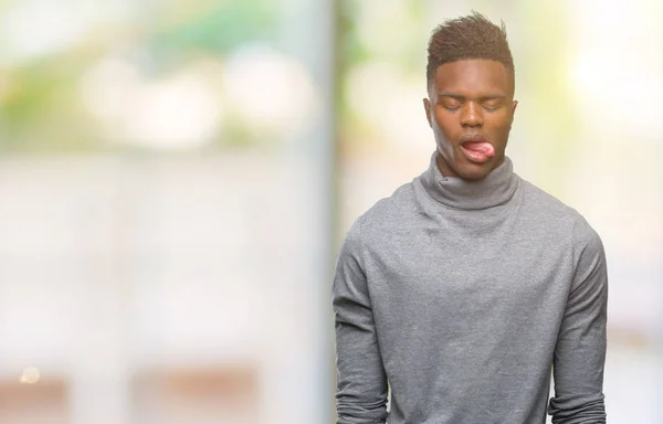 Jovem Homem Afro Americano Sobre Fundo Isolado Furando Língua Feliz — Fotografia de Stock