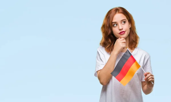 Jovem Bela Mulher Segurando Bandeira Alemanha Sobre Fundo Isolado Rosto — Fotografia de Stock