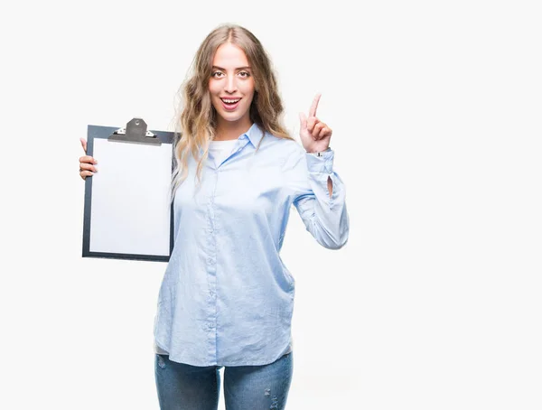 Beautiful Young Blonde Business Woman Holding Clipboard Isolated Background Surprised — Stock Photo, Image