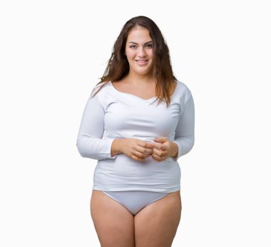 Artı boyutu genç overwight kadın güzel üzerinde beyaz iç çamaşırı giyiyor arka plan eller birlikte izole ve rahat ve neşeli gülümseyen parmak çarpı işareti. Başarı ve iyimser