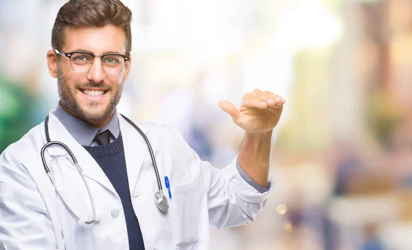 Young Handsome Doctor Man Isolated Background Gesturing Hands Showing Big — Stock Photo, Image