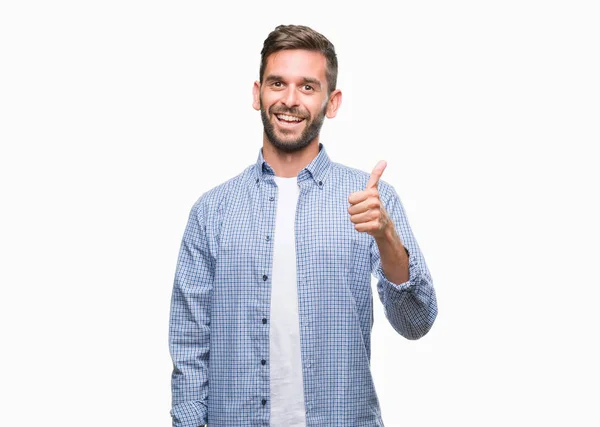 Joven Hombre Guapo Vistiendo Una Camiseta Blanca Sobre Fondo Aislado —  Fotos de Stock