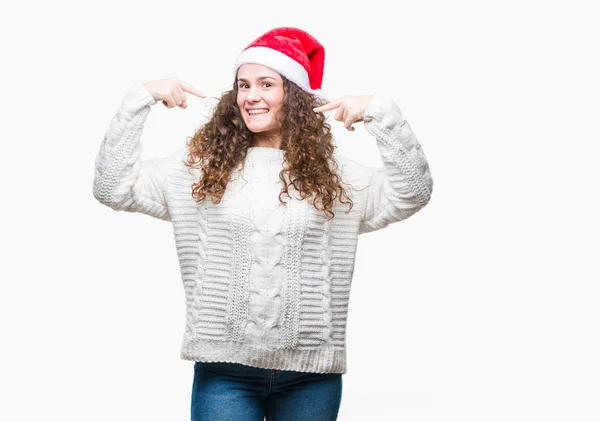 Menina Morena Jovem Usando Chapéu Natal Sobre Fundo Isolado Olhando — Fotografia de Stock