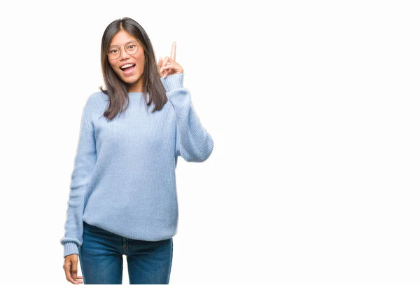 Young Asian Woman Wearing Winter Sweater Isolated Background Pointing Finger — Stock Photo, Image