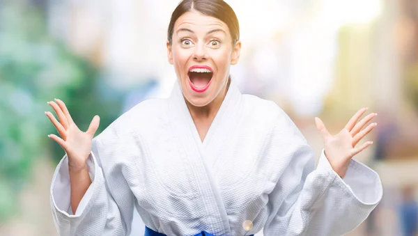 Joven Mujer Hermosa Con Uniforme Kimono Karate Sobre Fondo Aislado —  Fotos de Stock
