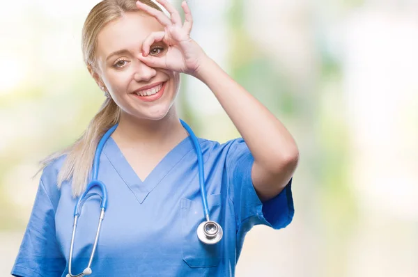 Young Blonde Surgeon Doctor Woman Isolated Background Doing Gesture Hand — Stock Photo, Image