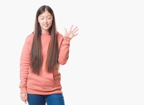 Young Chinese Woman Isolated Background Wearing Sport Sweathshirt Showing Pointing — Stock Photo, Image