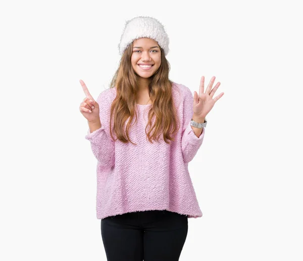 Junge Schöne Brünette Frau Trägt Pullover Und Wintermütze Über Isoliertem — Stockfoto