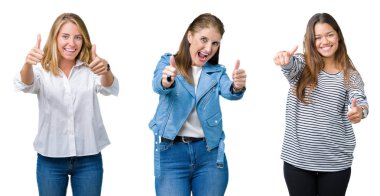 Kolaj grubunun onaylama beyaz izole zemin üzerinde üç güzel kadınların el ile olumlu hareketi yapıyor gülümseyen ve başarı için mutlu yaşasın. Kamera, kazanan jest arıyorsunuz.