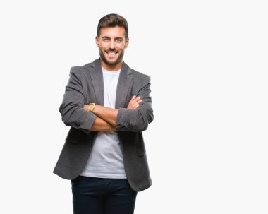 Kameraya bakarak çapraz silah ile gülümseyen izole arka plan mutlu yüzüne genç yakışıklı iş adamı. Olumlu bir kişi.