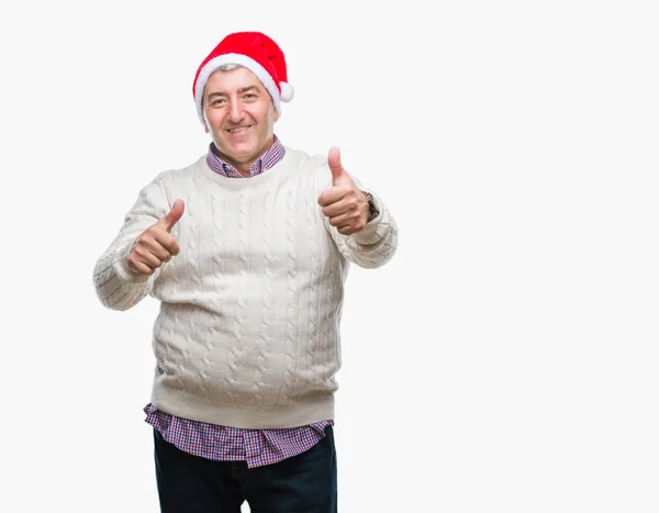 Bonito Homem Sênior Usando Chapéu Natal Sobre Fundo Isolado Aprovando — Fotografia de Stock