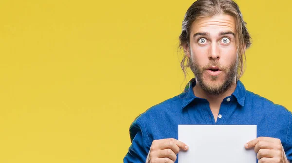 Young Handsome Man Long Hair Isolated Background Holding Blank Paper — Stock Photo, Image