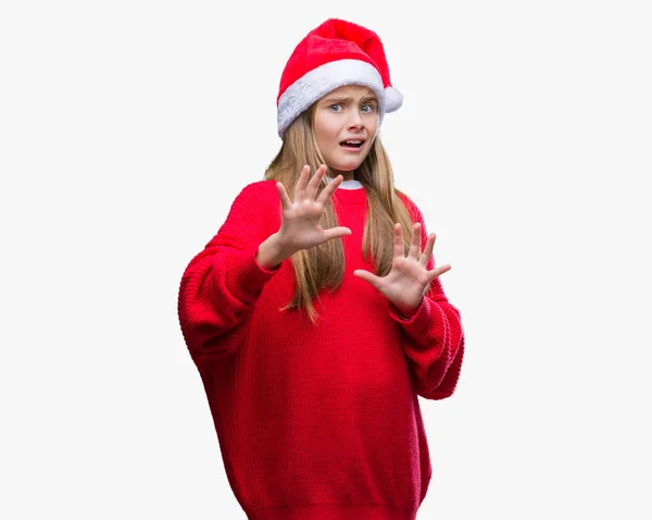 Όμορφη Κοπέλα Φορώντας Καπέλο Χριστουγέννων Πάνω Από Απομονωμένες Φόντο Φοβισμένος — Φωτογραφία Αρχείου