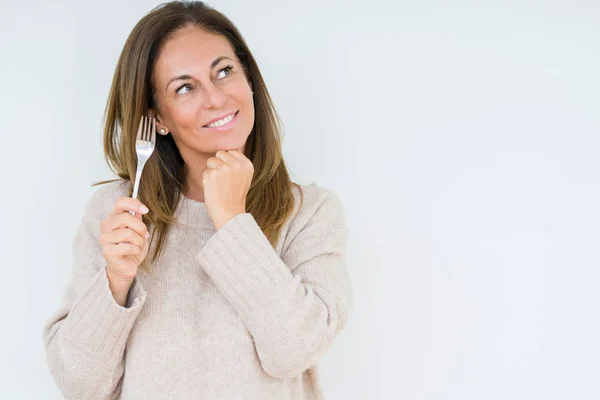 Frau Mittleren Alters Hält Silberne Gabel Metall Über Isoliertem Hintergrund — Stockfoto