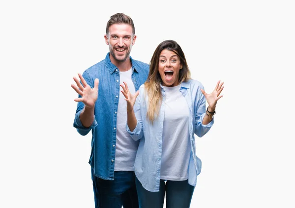 Young Couple Love Isolated Background Celebrating Crazy Amazed Success Arms — Stock Photo, Image