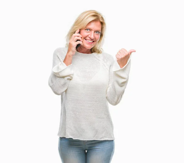 Middle Age Blonde Woman Talking Smartphone Isolated Background Pointing Showing — Stock Photo, Image
