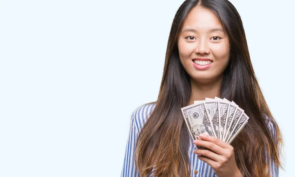 Jovem Mulher Asiática Segurando Dólares Sobre Fundo Isolado Com Rosto — Fotografia de Stock
