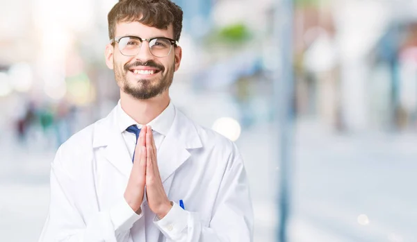 Young Professional Scientist Man Wearing White Coat Isolated Background Praying — Stock Photo, Image