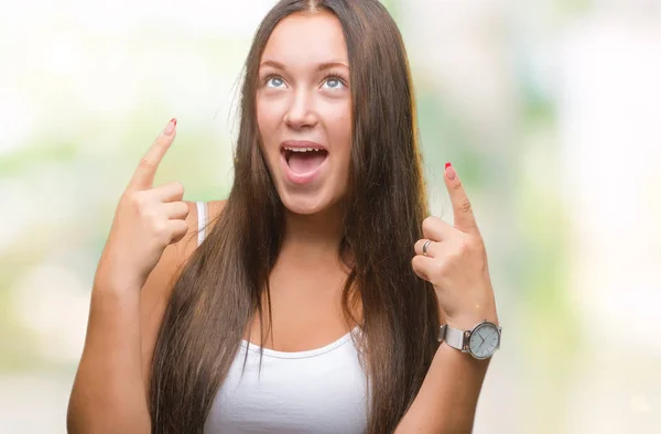 Young Caucasian Beautiful Woman Isolated Background Amazed Surprised Looking Pointing — Stock Photo, Image