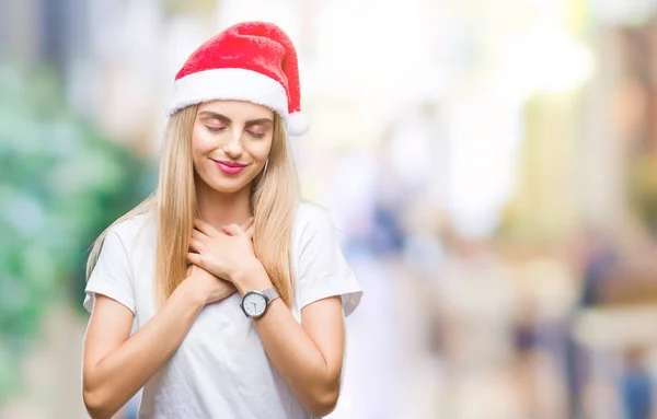 Jovem Linda Mulher Loira Chapéu Natal Sobre Fundo Isolado Sorrindo — Fotografia de Stock