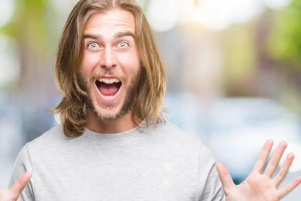 Young Handsome Man Long Hair Isolated Background Celebrating Crazy Amazed — Stock Photo, Image