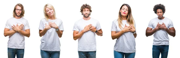 一群人穿着休闲的白色 T恤在孤立的背景微笑着双手在胸前闭着眼睛 并在脸上作出感激的姿态 健康理念 — 图库照片