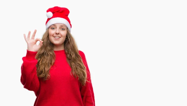 Unga Blonda Kvinnan Jultomten Hatt Gör Tecken Med Fingrarna Utmärkt — Stockfoto