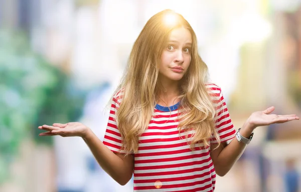 Unga Vackra Blonda Kvinnan Över Isolerade Bakgrund Aningslös Och Förvirrade — Stockfoto