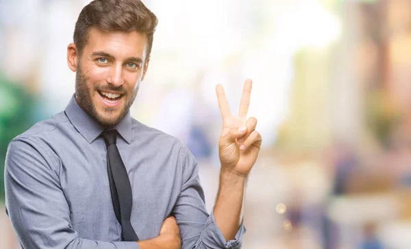 Joven Hombre Negocios Guapo Sobre Fondo Aislado Sonriendo Con Cara —  Fotos de Stock