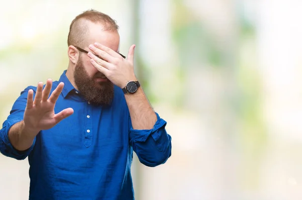 Young Caucasian Hipster Man Wearing Glasses Isolated Background Covering Eyes — Stock Photo, Image