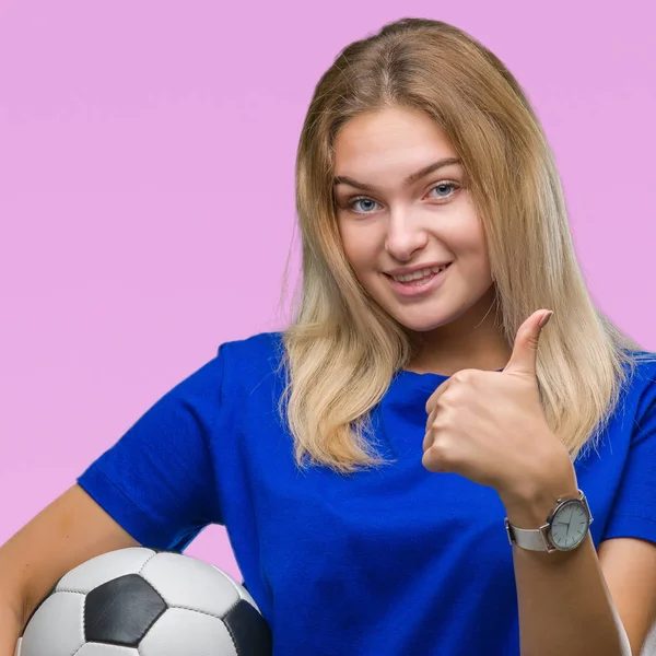 Junge Kaukasische Frau Hält Fußball Über Isolierten Hintergrund Glücklich Mit — Stockfoto