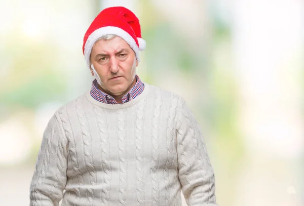 Bonito Homem Sênior Vestindo Chapéu Natal Sobre Fundo Isolado Deprimido — Fotografia de Stock