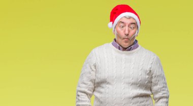 Noel şapka izole arka plan yapma balık yüzüne dudaklı, çılgın ve komik bir jest yakışıklı komuta sizde. Komik ifade.