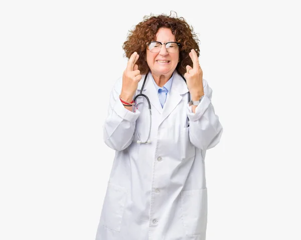 Middle Ager Senior Doctor Woman Isolated Background Smiling Crossing Fingers — Stock Photo, Image