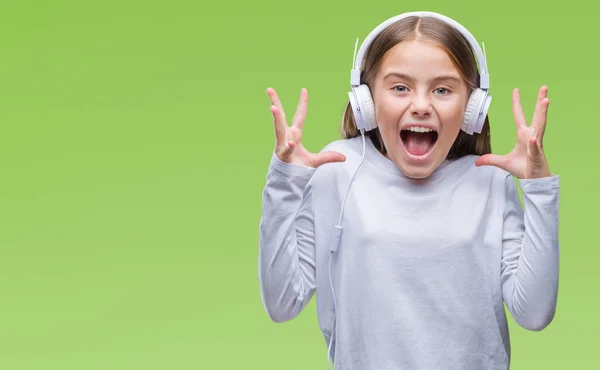 Giovane Bella Ragazza Con Cuffie Ascoltare Musica Sfondo Isolato Celebrando — Foto Stock