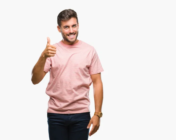 Jovem Homem Bonito Sobre Fundo Isolado Fazendo Polegares Felizes Gesto — Fotografia de Stock