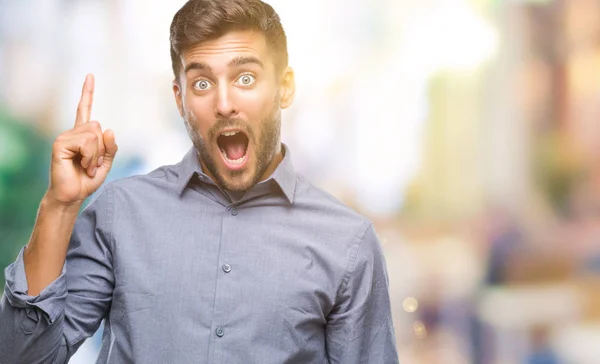 Joven Hombre Guapo Sobre Fondo Aislado Apuntando Con Dedo Hacia — Foto de Stock