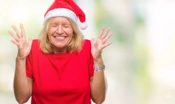 Mujer Rubia Mediana Edad Con Sombrero Navidad Sobre Fondo Aislado —  Fotos de Stock